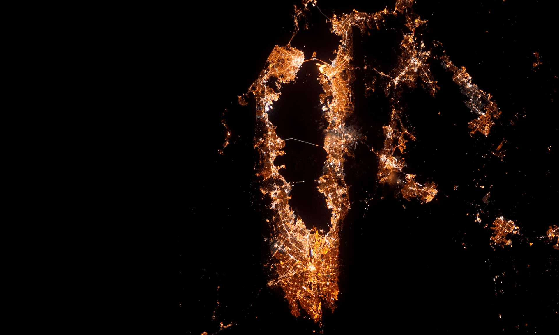 Aerial nighttime satellite view of the San Francisco Bay Area